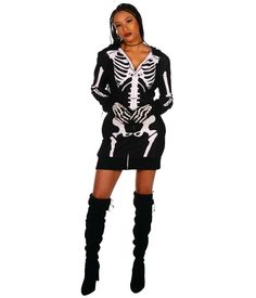 a woman in a skeleton costume posing for the camera with her hands on her hips