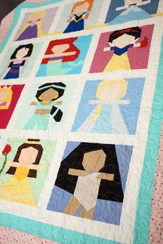 a quilt with pictures of people on it