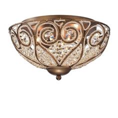 a flush light fixture with an intricate design on the front and back sides, in bronze finish