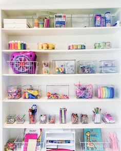 the shelves are filled with craft supplies and crafts