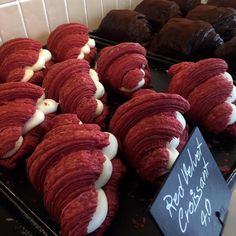 red velvet crepes with white icing are on display