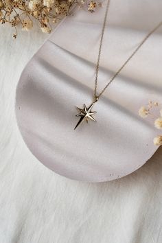 ABOUT PRODUCT 14K Celestial North Star Necklace, Real Gold Star Necklace,Birthday Gift,Christmas Gift,Fine Jewelry This 14K gold celestial north star necklace is beautifully designed and hand crafted with our associates to make this a special gift for your loved ones. Knowing the value of our customers. We prepare each piece with extra care and attention. ITEM DETAILS Material: 14K Gold Approx: 2,00 gr Available colors: Gold, Rose Gold, White Gold Available Sizes: 14" to 20" ★ 14k Solid Gold (Ce Gold Star Jewelry For Christmas, Yellow Gold Starburst Necklace For Gift, Yellow Gold Starburst Necklace As Gift, Gold Star Necklace For Birthday Gift, Gold Starburst Necklace For Gift, Gold Star Necklaces For Birthday Gift, Christmas Star Charm Jewelry Gift, Star-shaped Jewelry For Christmas Gift, Star-shaped Christmas Gift Jewelry