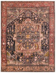 an antique rug with many different colors and patterns