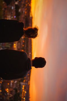 two people looking out at the ocean with a quote from typorma on it