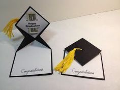 two graduation caps with congratulations written on them