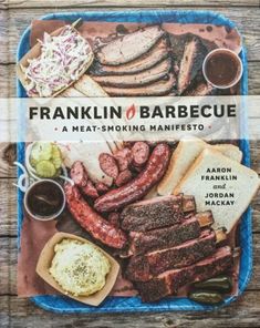 the cover of franklin barbecue is shown with meats, bread and coleslaw