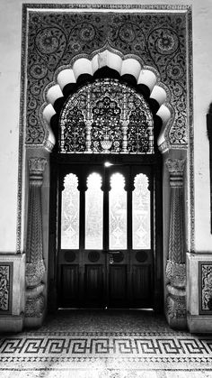 an ornate doorway with columns and arches