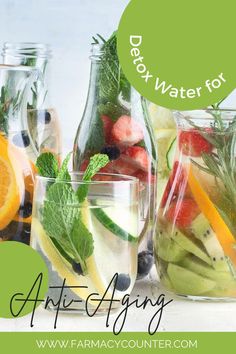 several glass jars filled with different types of fruit and veggies, including water