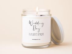 a wedding day candle is shown in front of a white background with the words,