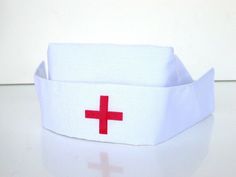 labscostumes labs costumes ADULT WOMENS WHITE NURSE COSTUME HAT CAP WITH RED CROSS DOCTOR HOSPITAL 　 COSTUMES    Stage Make-up    WIGS&Masks    FX&acsry.    Clearance 　 　 　 　   　 Nurse Hat   Includes: Nurse hat  Material: 100% Polyester Color: White and Red Size: One size fits most adult Bonus: 2 Free Bobby pins Art .20334   　 　 　 　 　 　 ---------------------------------------------------------------------------------------- Doctor Hospital, Nurse Art, Hospital Nurse, Nurse Costume, Nurse Hat, Nursing Cap, Stage Makeup, Pin Art, Costume Hats