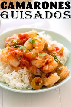 a white plate topped with rice and shrimp