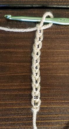 a crochet hook with the number one on it