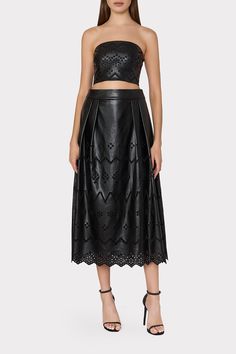 The Jolene skirt is made from our buttery soft vegan leather that feels like the real thing. It’s a full swingy skirt accented with eyelet embroidery detail that falls to a midi, scalloped hemline. Wear it with its coordinating Lois Eyelet Crop Top. Vegan Leather Skirt, Eyelet Embroidery, Luxury Dresses, Black Leather Skirts, Maxi Dress Cocktail, Cocktail Evening Dresses, Denim Coat Jacket, Luxury Dress, Denim Coat