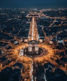 an aerial view of the eiffel tower in paris, france at night time