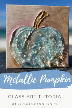 an acrylic pumpkin painted on canvas with text overlay that reads metalic pumpkin glass art tutor