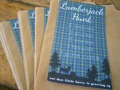 four notebooks with the words lumber hunt written on them sitting on a wooden table