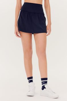 A lightweight easy to wear skort with contrast stripes in our ultra luxe, super soft Airweight fabric. Quick dry super powers, so you're safe working up a sweat. BEST FOR: Running, tennis, pickleball, court sports, spin class, cycling and gym workouts.Model Stats:Height: 5’9”, Bust: 32.”5, Waist: 23.5”, Hips: 35”Wearing size: Small Casual Short Tennis Dress With Built-in Shorts, Casual Tennis Dress With Built-in Shorts, Athleisure Short Tennis Skirt For Workout, Sporty Tennis Skort With Short Inseam, Sporty Skort With Elastic Stretch Waistband, Sporty Tennis Skirt With Built-in Shorts, Sporty Stretch Skort With Elastic Waistband, Sporty Tennis Skort, Short Activewear For Tennis In Spring