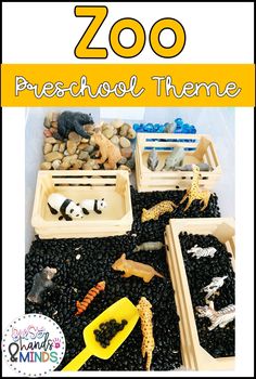 the zoo preschool theme is shown with toys and rocks