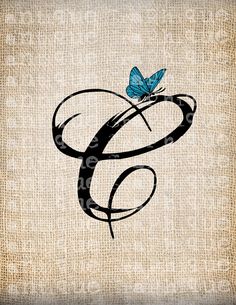 a blue butterfly sitting on top of a monogrammed letter g in black and white