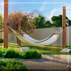 a white hammock sitting in the middle of a garden