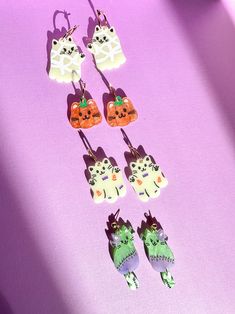 🎃 Introducing our Spook-tacular Halloween Cat Earrings Collection! 🐱👻 Weight: 0.18oz Height: ~ 2 inches Each design of earrings is unique and cannot be exactly replicated. Extremely light and comfortable to wear. Slight variation may occur compared to the pictures as they are handmade items. All earrings are made of acrylic with hypoallergenic, nickel-free stainless steel post. ..................................................... Earrings purchased are strictly non-exchangeable and non-refun Halloween Cat Earrings, Crazy Earrings, Pumpkin Cat, Steel Post, Halloween Earrings, Cat Earrings, Earring Findings, Halloween Cat