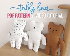 three teddy bears sitting on top of a wooden shelf next to a sign that reads, teddy bear pattern + video tutor