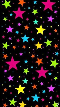 many colorful stars on a black background