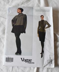 a woman's jacket and skirt sewing pattern on top of a white bed sheet