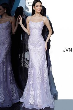 Jovani JVN02012 is a long Fitted embroidered lace Prom Dress featuring a modest neckline with spaghetti straps. Corset back ensures a perfect fit & a touch of class. Embroidered lace cascades down the bodice or the dress into the tulle edge skirt. Lace up corset back. JVN 02012 Available Colors: lilac, royal, wine Available Sizes: 00, 0, 2, 4, 6, 8, 10, 12, 14, 16, 18, 20, 22, 24 Closure: Invisible Back Zipper with Hook and Eye Closure. Details: Embroidered prom dress, fitted silhouette, floor-l Lace Corset Dress Prom, Lilac Formal Dress Mermaid, Lavender Lace Prom Dresses, Sheer Corset Top Prom Dress, Light Purple Corset Prom Dresses, Lilac Mermaid Prom Dresses, Junior Prom Dresses Corset, Embroidered Prom Dress, Lilac Prom Dresses