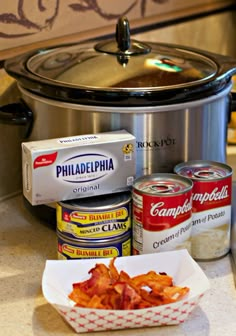 some food is sitting in front of an electric pressure cooker