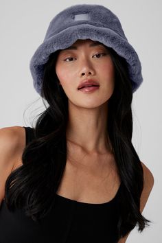 Lightweight. Super-soft. Street-ready. The Faux Fur Bucket Hat is the perfect choice for warming winter headwear in an on-trend bucket hat silhouette. Hat Silhouette, Winter Headwear, Fur Bucket, Faux Fur Bucket Hat, Fur Bucket Hat, Alo Yoga, Warm Winter, Bucket Hat, Faux Fur