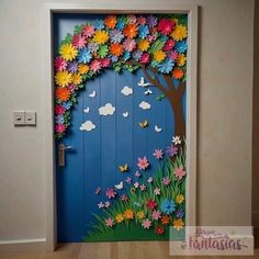 the door is decorated with flowers and trees