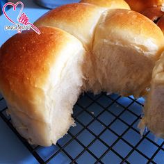 several rolls on a cooling rack ready to be eaten