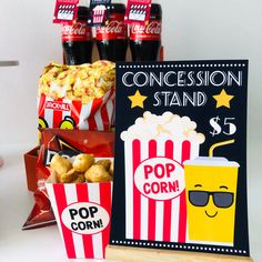 popcorn, pop corn and movie tickets are on display