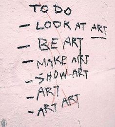 graffiti written on the side of a white wall that says to do look at art be art make art show art art