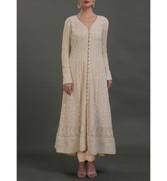 Get regal and festive with this exquisite, heavy all over hand embroidered tunic kurta dress!! When it is time to celebrate, this dress is a must!! All over delicate, exquisite Hand Embroidery called Chikankari Made to Order, tailored dress Average length: 48 in Length of product may slightly vary as per the sizes. Please note: smaller size may be slightly shorter and bigger size may be slightly longer in length Can purchase the whole set or just the Kurta Dress Available in may colors Fully cus Luxury Churidar With Chikankari Embroidery And Straight Kurta, Luxury Long Cream Kurta, Luxury Semi-stitched Floor-length Churidar, Luxury Straight Kurta Churidar With Chikankari Embroidery, Luxury Long Churidar With Chikankari Embroidery, Kurta Maxi Dress, Long Midi Dress Indian, Traditional Front Open Sharara With Resham Embroidery, Anarkali Kurta With Zari Work And Front Open