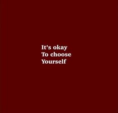 the words it's okay to choose yourself in white on a dark red background