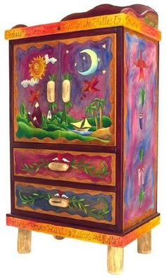 a colorful painted cabinet with drawers on it's sides and an image of the moon in the sky