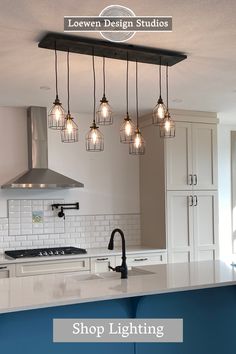 an image of a kitchen with lights hanging from it's ceiling and the words, shop lighting