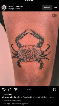 a crab tattoo on someone's leg