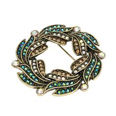 This mesmerizing antiqued gold tone wreath brooch features iridescent aurora borealis, yellow and clear simulated crystal accents for a look you'll love. This mesmerizing antiqued gold tone wreath brooch features iridescent aurora borealis, yellow and clear simulated crystal accents for a look you'll love. ACCESSORY DETAILS Dimensions: 4 in. x 4 in. Back length: 2 in. Metal: alloy Plating: gold tone Finish: antiqued Material: glass Not appropriate for children 14 years old and younger. Size: One Crystal Wreath, Blue Aurora Borealis, Blue Aurora, 1928 Jewelry, Vintage Inspired Jewelry, Cameo Jewelry, Drop Pendant Necklace, Vintage Style Jewellery, Art Nouveau Jewelry