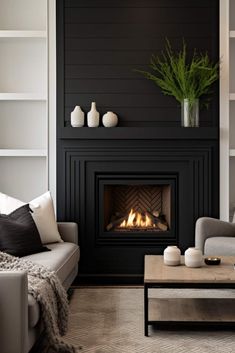 a living room filled with furniture and a fire place in the middle of the room