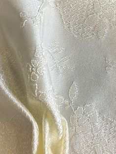 One of our more recent additions to our range of brocade fabrics, Antwerp has a lovely lustre and soft, silky handle. The design is of alternating bands of satin and lattice work with delicate floral motifs combined in the design. This really is an elegant jacquard woven fabric that is suitable for dressmaking and wedding waistcoats. Manufactured here in Lancashire, this brocade fabric measures 126 cm (50") wide that is available in a range of colours from stock, and without minimum quantity wit Wedding Waistcoats, Calico Fabric, Crystal Trim, Bridal Fabric, Gold Fabric, Jacquard Weave, Fabric Trim