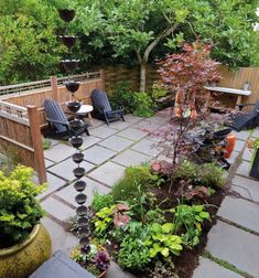 an outdoor patio with chairs and plants