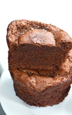 three chocolate brownies stacked on top of each other