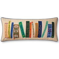 a decorative pillow with books on it