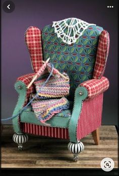 a chair that has some crochet on it