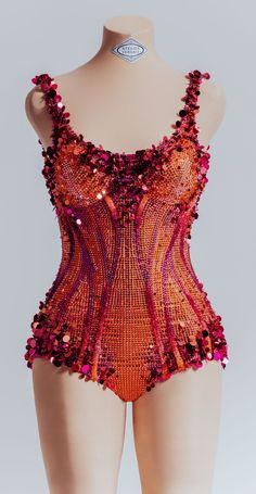 an orange bodysuit with red sequins on it