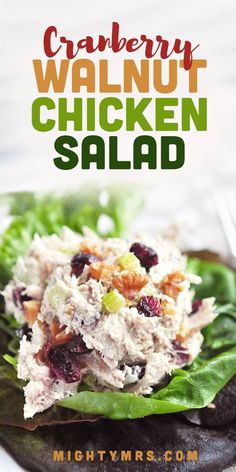 chicken salad with cranberries and walnuts in lettuce leaves on a plate