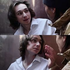 the young man is getting his hair cut by an older woman in front of him